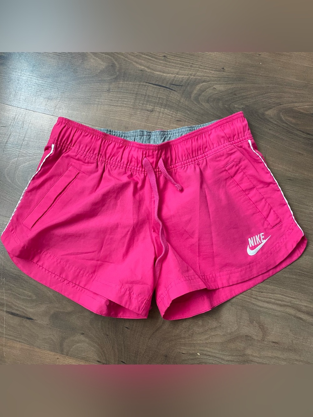 Nike Hot Pink Women's Athletic Shorts with White Logo